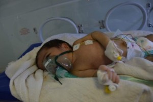 Iraqi baby in Fallujah. Credit: Donna Mulhearn.