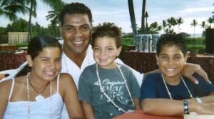 The late Junior Seau and his children in better times. Seau, a former NFL linebacker, killed himself last year. A postmortem diagnoses found he was suffering from a brain disease caused by too many blows to the head.