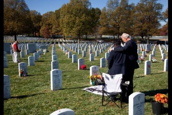 Vice President Joe Biden grieves at the grave a soldier at Arlington National Cemetery, Nov. 11, 2010.
