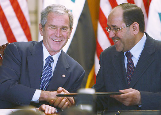 President Bush and Prime Minister Maliki signing the Strategic Framework and Security Agreement  2008