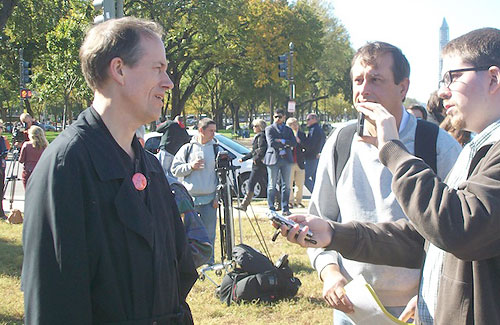 Tom Drake is interviewed at the Stop Watching Us rally in Washington in October